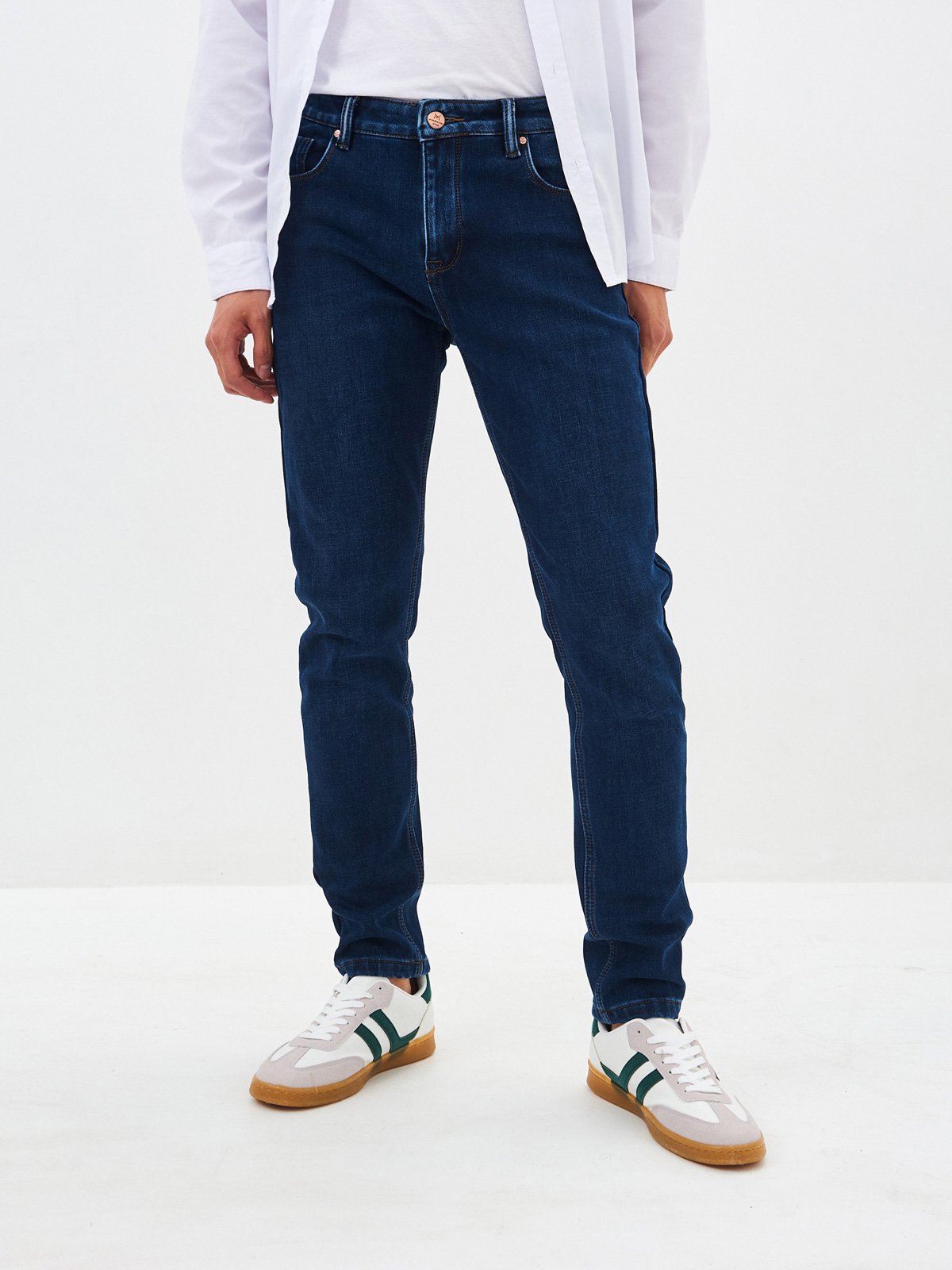 Утепленные мужские джинсы зауженного кроя на флисе